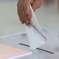 КС РФ допустил возможность переноса даты выборов в Госдуму
